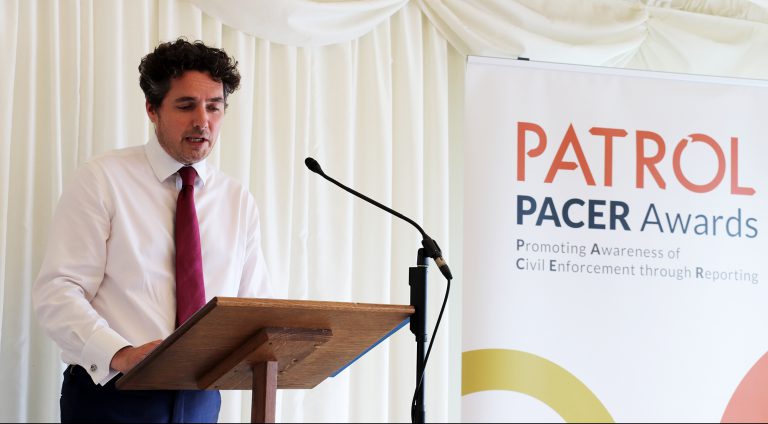 Huw Merriman MP speaking on stage at the PATROL PACER Awards